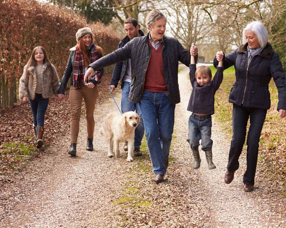 family walking on a nature trail